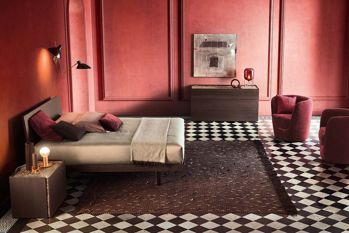 Alfa bed, oplà red armchairs, atlante casegoods pianca ulisse rug tessoria asolana