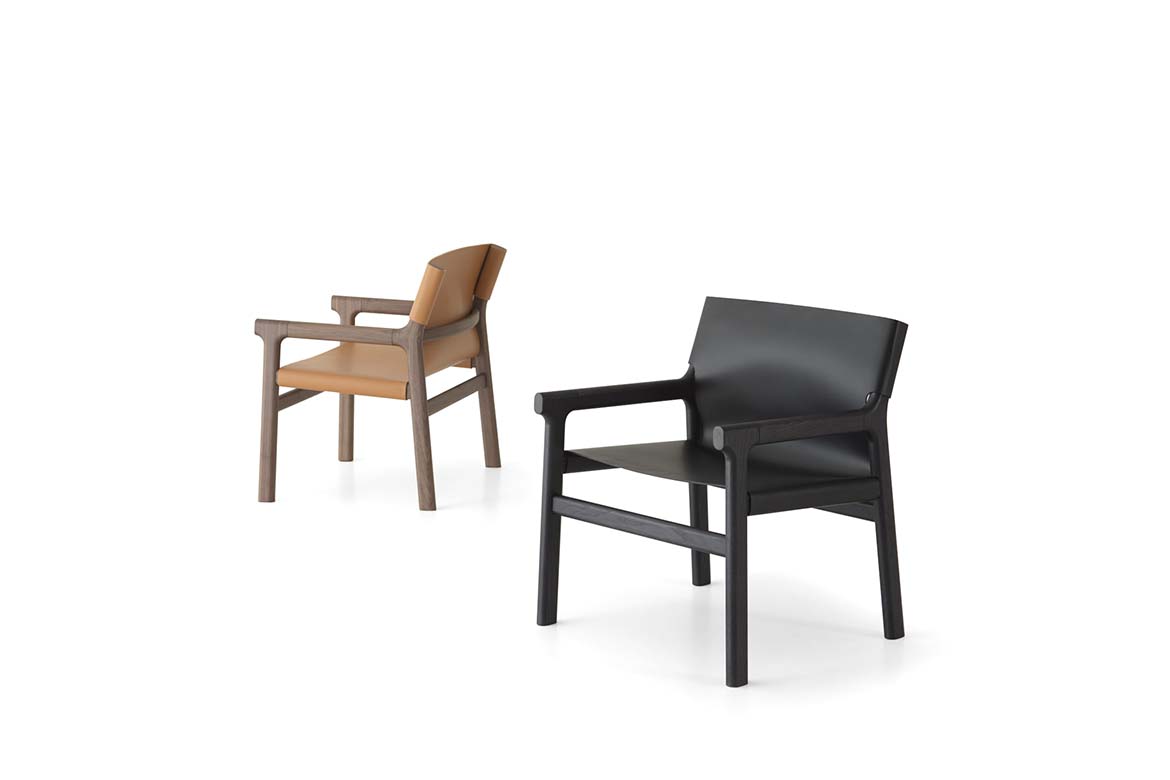fushimi lounge design philippe tabet nuovi prodotti disegnati per pianca, poltrona con struttura in legno e seduta in cuoio nero o arancione hermes