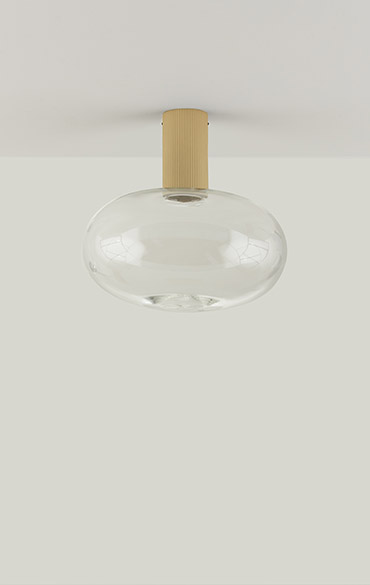 lampada da soffitto con struttura in ottone e calotta in vetro trasparente di design moderno